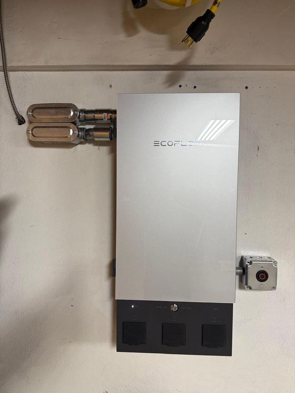 EcoFlow backup unit mounted on a garage wall